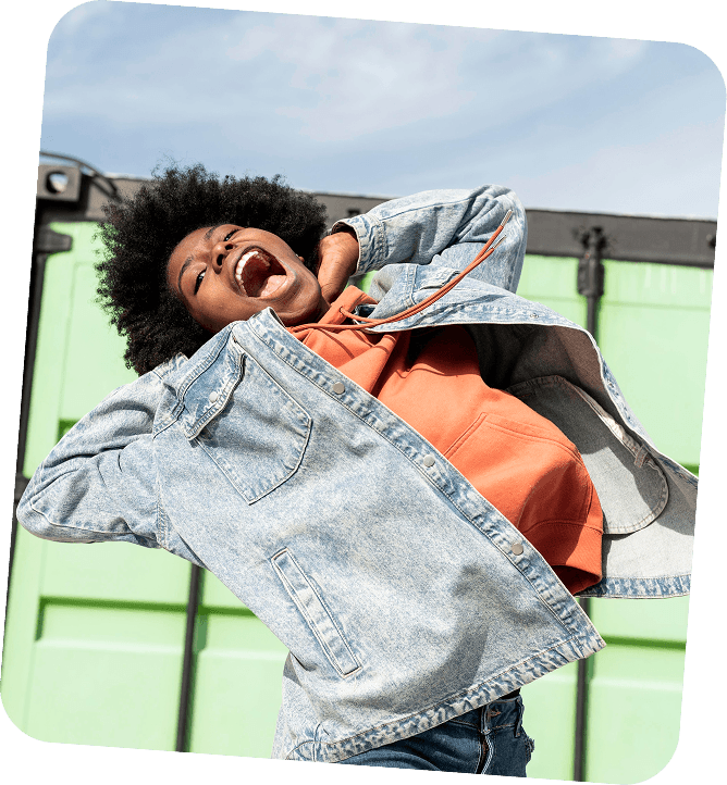 Woman styling a preloved denim jacket