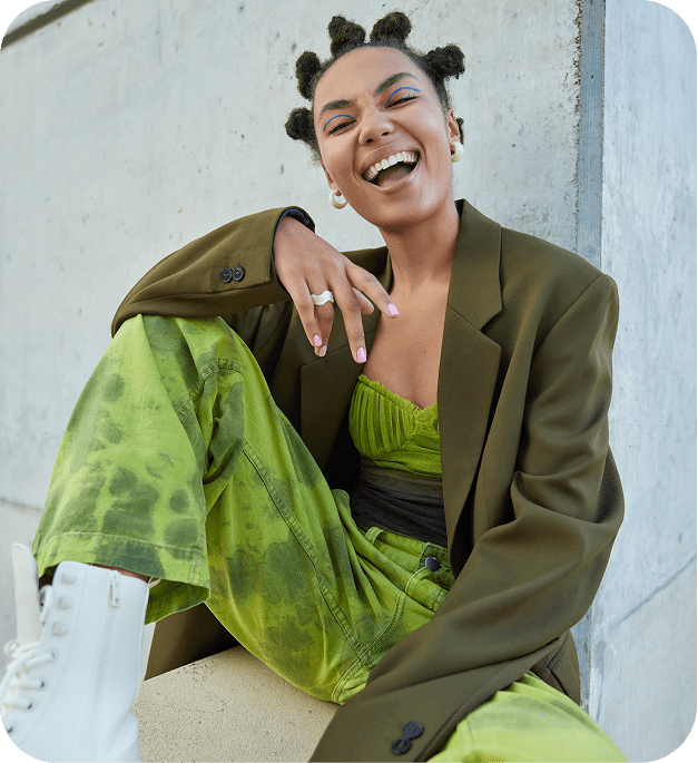 Woman wearing a green statement outfit
